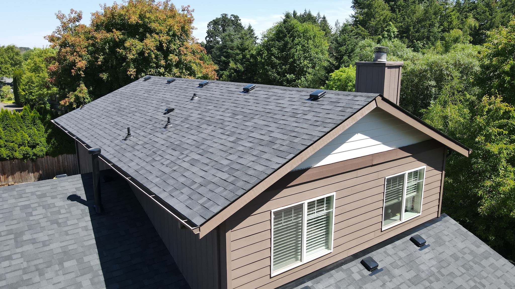 Finished roof replacement on a two-story home