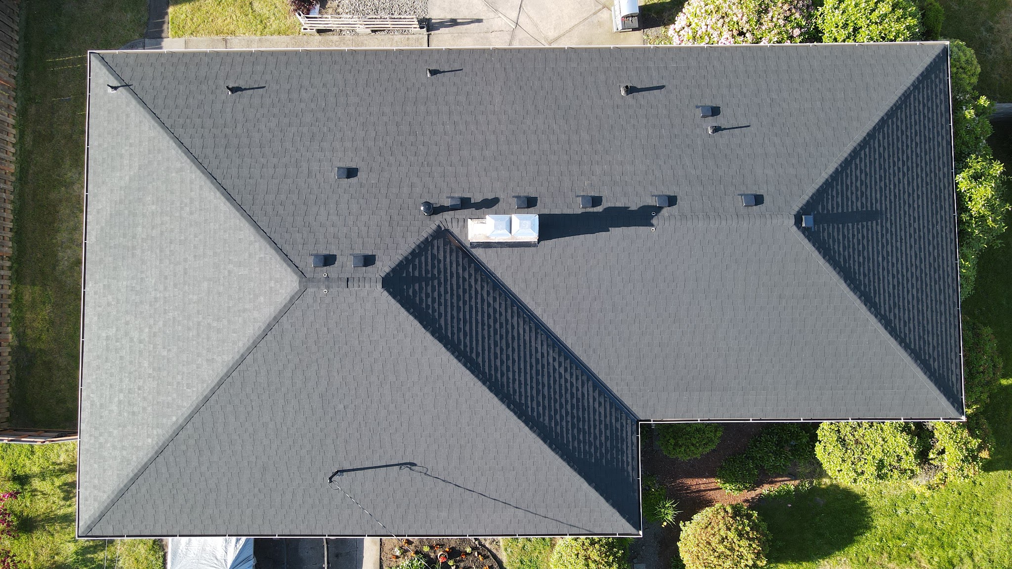 Aerial view of a finished shingle roof job